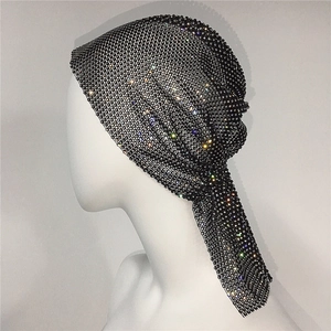 Close-up of black mesh rhinestones headpiece for festivals with sparkling silver crystals