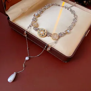 Baroque drop pearl necklace with sparkling rhinestones in a luxury jewelry box