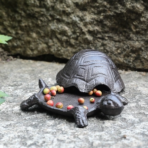 Vintage cast iron turtle storage box with detailed shell texture for home decor