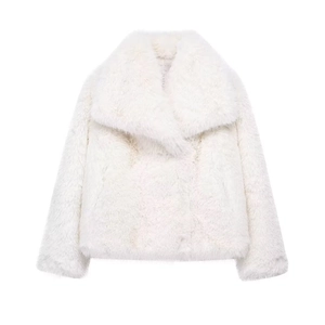 Detail shot of white faux fur texture on short jacket with large lapel collar