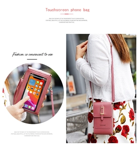 Detail of crossbody phone bag with transparent touchscreen window and gold buckle