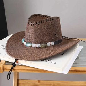 Dark brown western cowboy straw hat with turquoise beaded band and chin strap