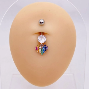 Rainbow heart-shaped belly button ring with large clear zircon on a silicone body model