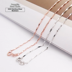 Detailed view of S925 sterling silver melon seed chains in silver and rose gold finish