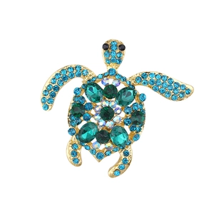 Exquisite sea turtle brooch with green crystals and blue rhinestones in gold setting