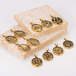 Religious oval portrait pendants in 18k gold plated stainless steel on stone slabs
