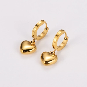 Polished gold stainless steel hoop earrings with minimalist heart pendants on white backdrop