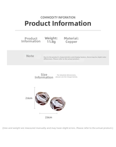 Detailed view of silver wrinkled sphere earrings with 2.6cm diameter and 11.8g weight