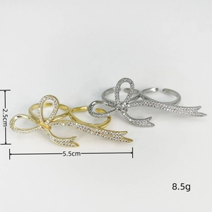 Detailed view showing dimensions 5.5cm x 2.5cm of luxury rhinestone bow ring