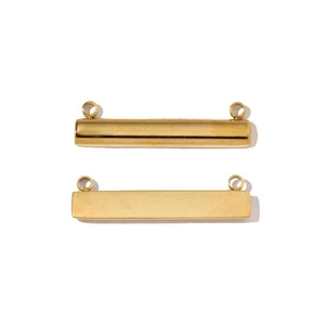 Detail view of two gold stainless steel long bar connectors for DIY jewelry making