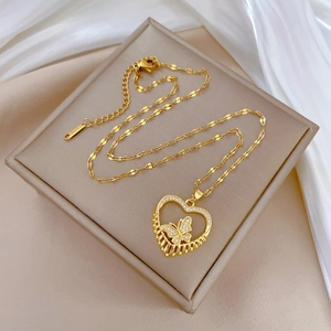 Gold stainless steel necklace featuring a hollow heart pendant with a butterfly detail