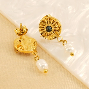 Vintage gold starburst earrings with blue zircon and elegant pearl pendants