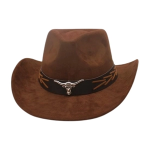 Detail of western cowboy hat featuring silver bull head emblem and golden embroidery