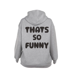 Detail of the light grey hoodie showing the black artistic print on the back fabric