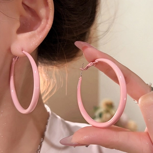 Chic pink enamel hoop earrings for women showing polished finish and large circular style