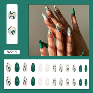 Detail view of W215 press-on nails set with green and white wave pattern designs