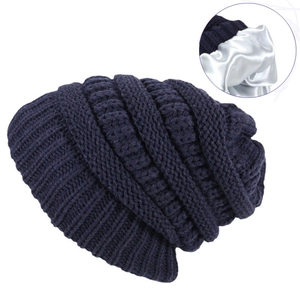 Winter knit beanie in navy blue with smooth white satin lining for hair protection