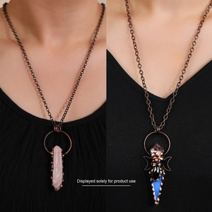 Detail view of retro bronze chain necklaces featuring natural stone and cone-shaped pendants
