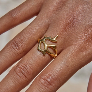 Detailed view of an 18k gold-plated stainless steel hollow coral-shaped open ring for women