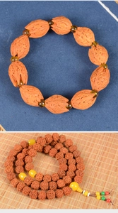 Detailed close-up of Nepalese Rudraksha beads with yellow amber and colorful tassels