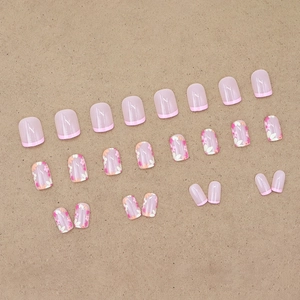 Short square press-on nails set featuring pink French tips and colorful floral patterns