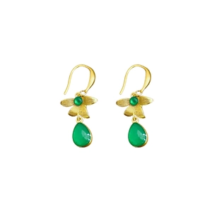 Vintage floral resin drop earrings with gold petals and green stones on white background