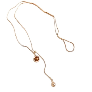 Vintage gold Y-shaped snake chain necklace with tiger eye stone and spherical pendant