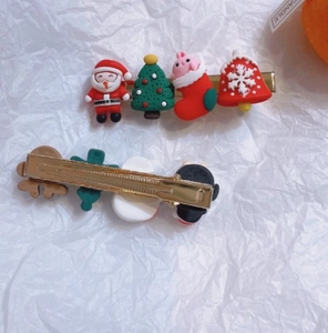 Christmas Santa and tree hair clips set with festive resin decor on white background