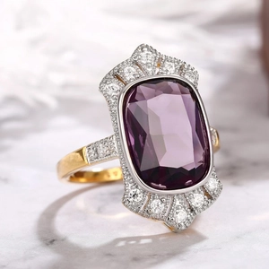 Vintage cocktail ring with rectangular purple gemstone and pave-set diamond borders