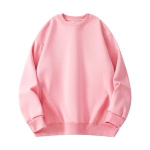 Pink crew neck sweatshirt in a loose fit with ribbed cuffs and hem on white background