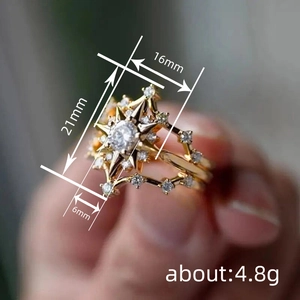 Bohemian gold starburst ring with white zircons and dimensions showing 4.8g weight