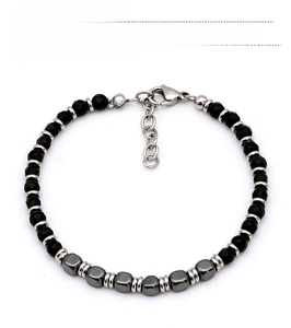 Detail of beaded bracelet with hematite squares, black beads and stainless steel clasp