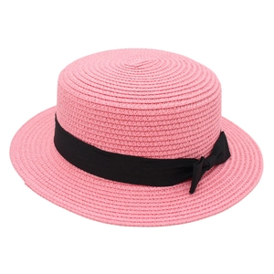 Elegant pink straw boater hat with a wide black ribbon bow and minimalist flat top design