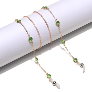 Elegant rose gold eyeglass chain with green crystal beads and silicone loops