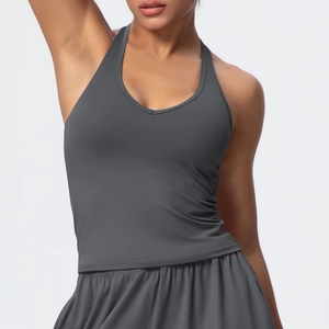 Detailed view of the dark grey V-neck sports bra and matching high-waisted gym shorts