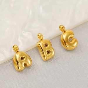 Polished gold bubble letter pendants A, B, and C in stainless steel for necklaces