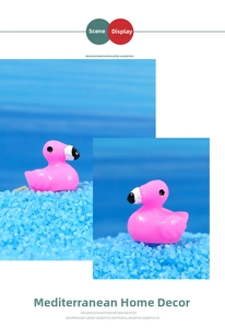 Miniature pink flamingo figurine on blue sand for micro landscape DIY bonsai decor