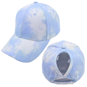 Detail of blue and white tie-dye ponytail baseball cap with functional back opening