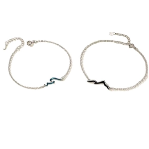Matching couple bracelets with creative mountain and sea wave charms in silver finish