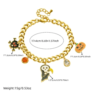 Detailed view of Halloween gold chain bracelet with skull, pumpkin and reaper charms