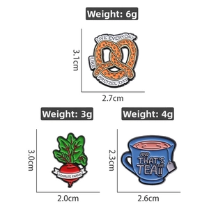 Detailed view of pretzel, beetroot, and tea cup enamel pins with precise dimensions and weight