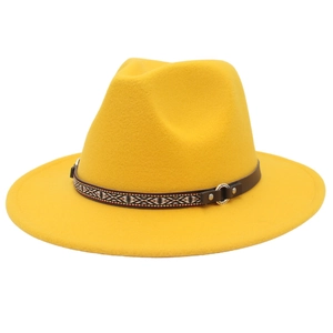 Close-up of bohemian hat band with leather buckle and metal rings on yellow fedora