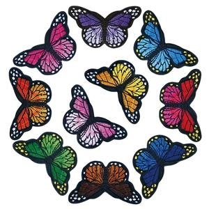 Set of 10 colorful butterfly embroidery patches for DIY clothing decoration on white background
