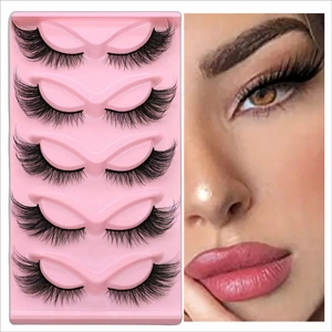 Detail showing 5 pairs of cat-eye false eyelashes with model wearing the dramatic long lashes