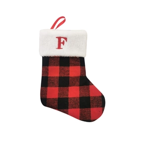 Red and black buffalo plaid Christmas stocking featuring embroidered letter F and fur trim