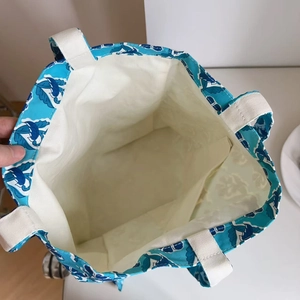 Top view of large capacity blue floral cotton tote bag showing the interior compartment