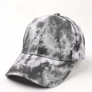 Detail view of 3D tie-dye pattern and reinforced stitching on the baseball cap brim