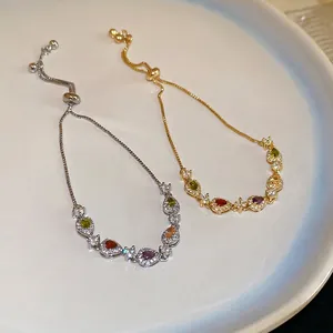 Adjustable bolo bracelets with pear-cut colorful zircons in gold and silver finish