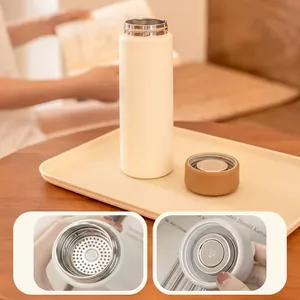 Detail view of the 304 stainless steel interior and tea filter of this matte thermos cup