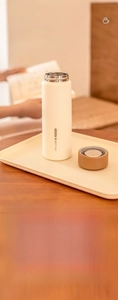 Detail view of the 304 stainless steel interior and tea filter of this matte thermos cup